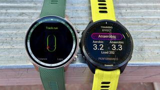 The OnePlus Watch 2R (left) and the Garmin Forerunner 965 (right)